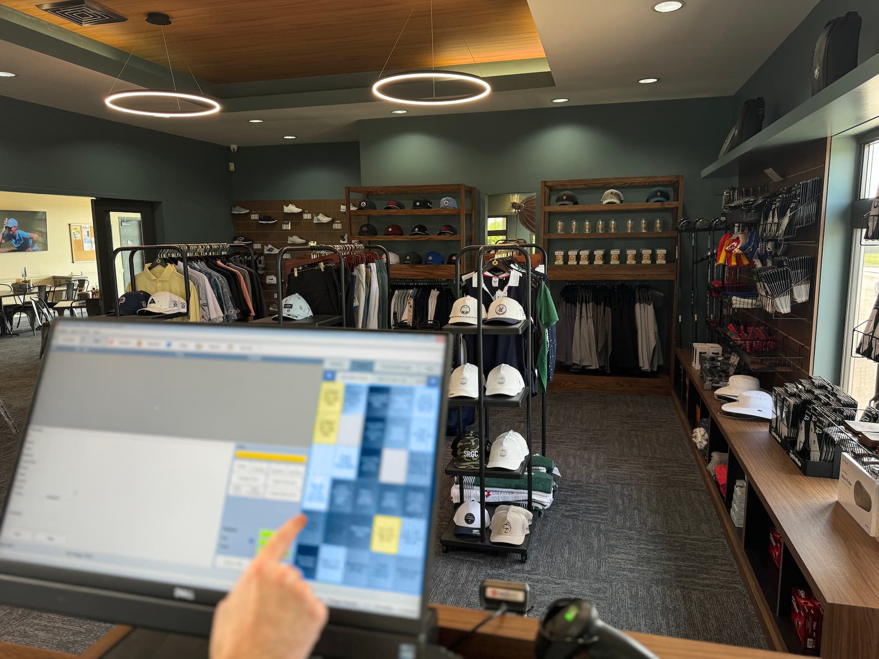 Picture of golf shop with tee quest software being used on a touch screen monitor.