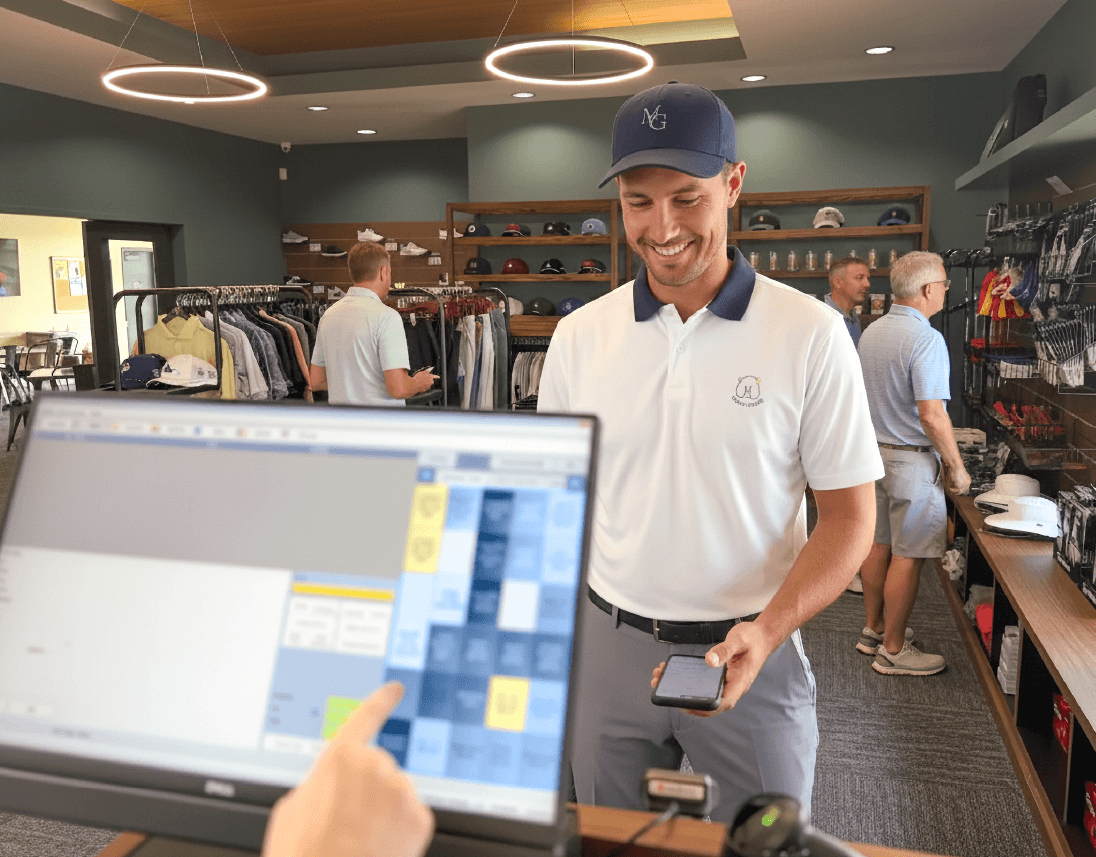 Picture of golf shop with tee quest software being used on a touch screen monitor.